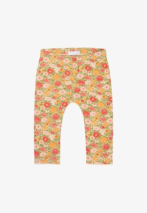 Legginsy w kwiaty na jasnoróżowym tle, z kolorowymi kwiatami w kolorze czerwonym, pomarańczowym i zielonym. Szczegół na dolnym brzegu w formie falbanek. Miękka tkanina.