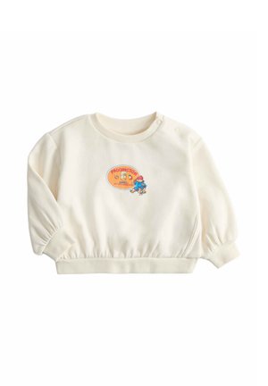 Bufret sweatshirts i cremet farve til småbørn med Paddington bjørne-grafik og teksten "Paddington elsker marmelade" på forsiden, med ribbet manchetter og kant.