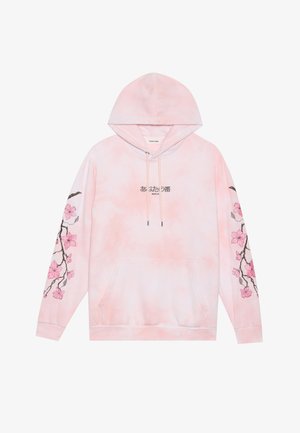 Sweatshirt cor-de-rosa com efeito tie-dye, apresentando bordados florais nas mangas, um bolso frontal e cordões na capucha. Textura de tecido suave.