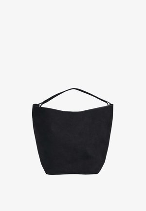 Mustast seemisnahast kott, millel on sile pind, ümarad küljed ja üks rihm. Omadusteks on minimalistlik disain ilma nähtava riistvara või mustriteta.