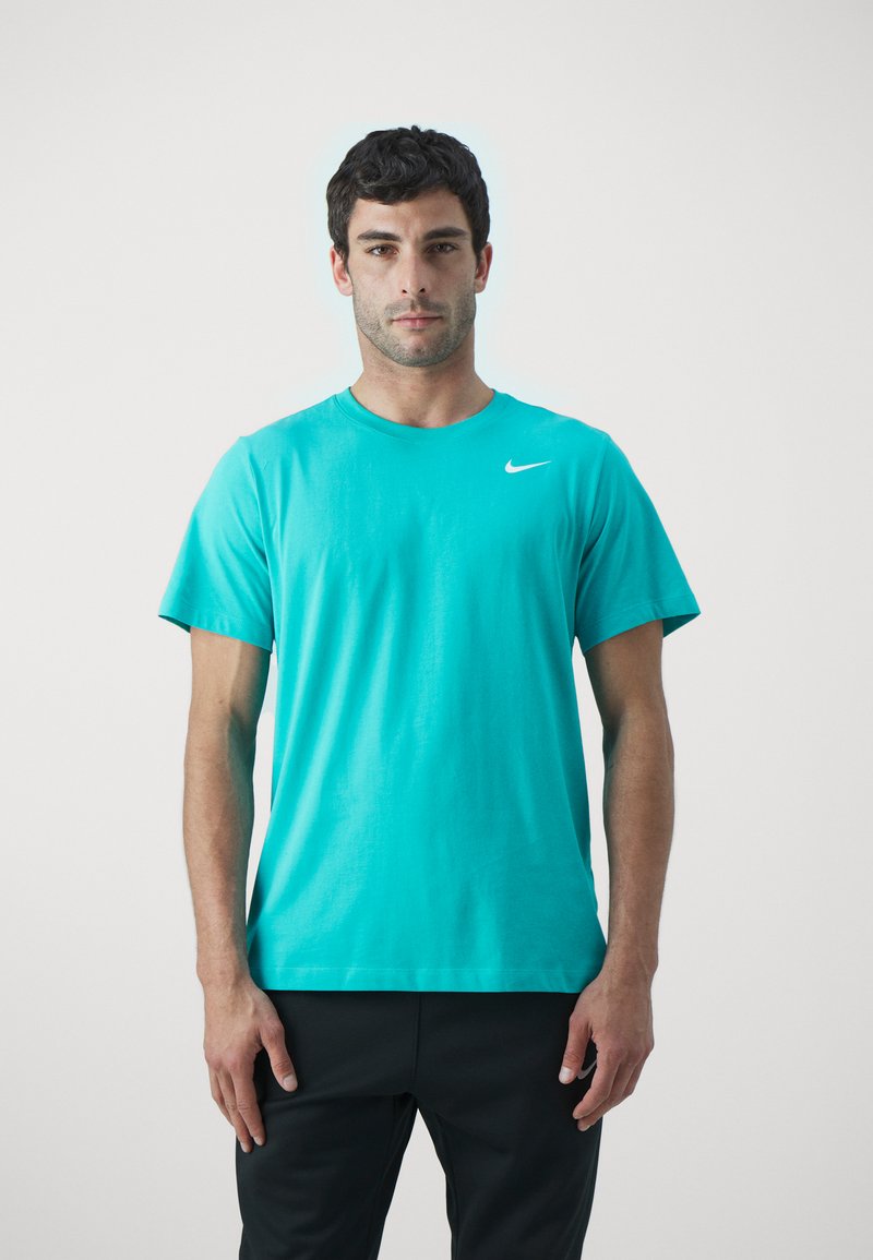 Nike Performance CREW SOLID - T-skjorte til trening - dusty cactus