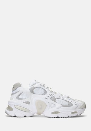 White and gray athletic sneaker with mesh panels, thick sole, lace-up closure, and "Polo" branding on the side.