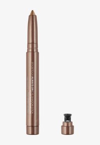 Bronsfärgad ögonskuggsstav med spetsig tipp; metallisk finish. Inkluderar ett svart vässartopp. Texten på sidan står "Smashbox Always On Eye Shadow Stick."