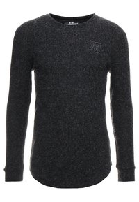 Tmavě šedé tričko s dlouhým rukávem z texturované látky, s kulatým výstřihem, zakřiveným lemem a malým vyšitým logem na hrudi.