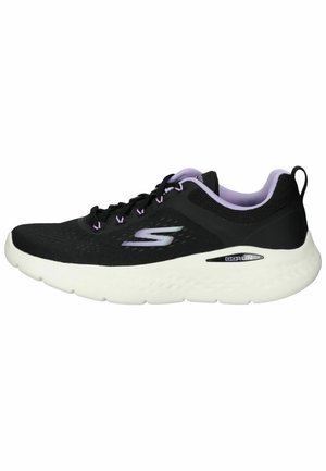 Black athletic shoe with a mesh upper, lavender accents, and a thick white sole. Features a logo and lacing system for secure fit.