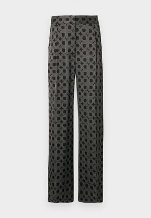 Pantalon à jambes larges en tissu doux, présentant une base noire avec un motif circulaire répété en lignes grises et blanches.