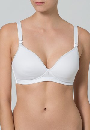 Soutien-gorge triangle blanc en tissu lisse, avec des bretelles réglables, un soutien-gorge à armatures et des coutures minimales pour un look sans couture.