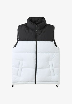 Kamizelka puchowa z czarną górną częścią i białym dołem, z zapięciem na zamek, wysokim kołnierzem i dwiema przednimi kieszeniami. Lekka i pikowana konstrukcja.