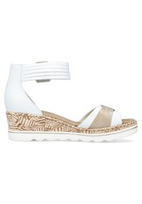 Sandale wedge blanche avec un talon en liège texturé. Présente une bride de cheville avec des détails en relief et un design de bout croisé.