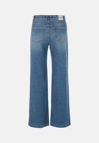 Wide-leg blue denim jeans with a faded finish, featuring two back pockets, a straight cut, and a branded label above the waistband.