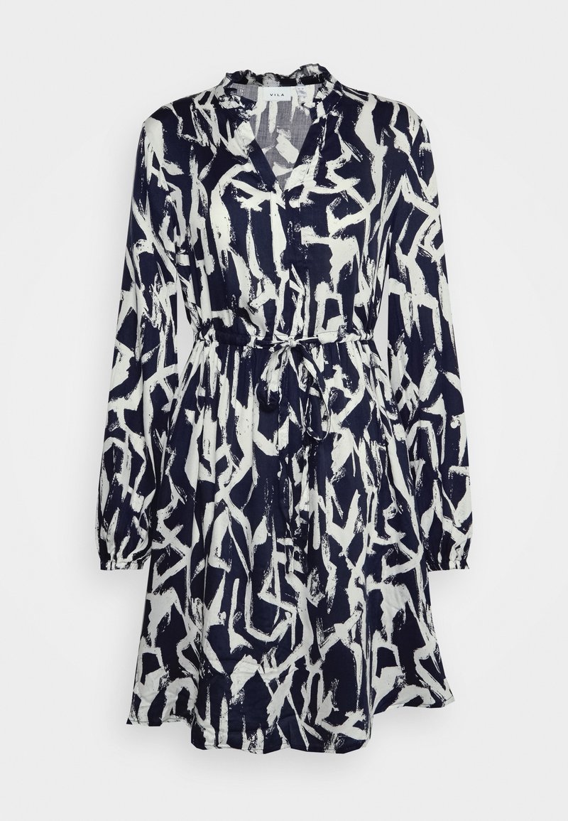 Long-sleeve navy dress with white abstract brushstroke pattern, V-neck, cinched waist with tie belt, and gathered collar detail.