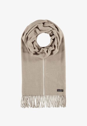 Beige strikket tørklæde med cirkulært design og lange frynser i enderne. Har et lille mærke med brandnavn nær bundkanten.