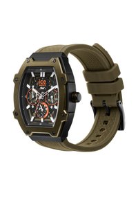 Reloj octogonal negro y verde oliva con correa texturizada, esfera transparente y diales negro/naranja que muestran características de cronógrafo.