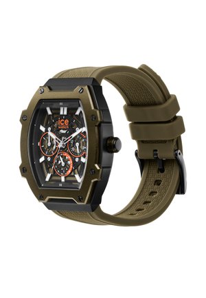 Montre octogonale noire et vert olive avec un bracelet texturé, un cadran transparent et des aiguilles noires/oranges affichant des fonctions de chronographe.
