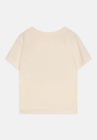 Cremer Kurzarm-T-Shirt mit Rundhalsausschnitt und geradem Saum. Hergestellt aus weicher Baumwolle, bietet es eine glatte Textur und ein einfaches Design.