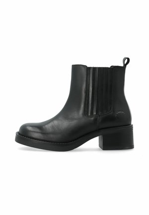 Bottine en cuir noir avec panneaux latéraux élastiques, languette au talon et talon bloc sur fond blanc.