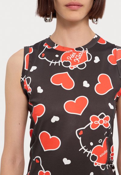 Black sleeveless top with Hello Kitty and heart patterns in red and white. Features a round neckline and visible stitching details.