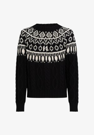 Sort strikket sweater med hvid mønstret yoke og kabel-strik tekstur. Ribbet halsudskæring og manchetter for ekstra detaljer.