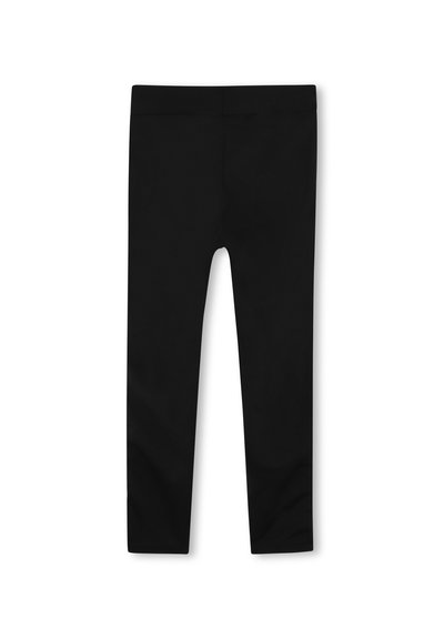 Leggings noirs en matériau extensible, dotés d'un design ajusté avec une taille mi-haute et sans coutures ni motifs visibles.