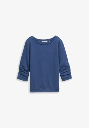 Modra dolga majica z dolgimi rokavi, narejena iz mehkega materiala, z širokim izrezom in nabranimi detajli na rokavih. Gladka tekstura, sproščen kroj.