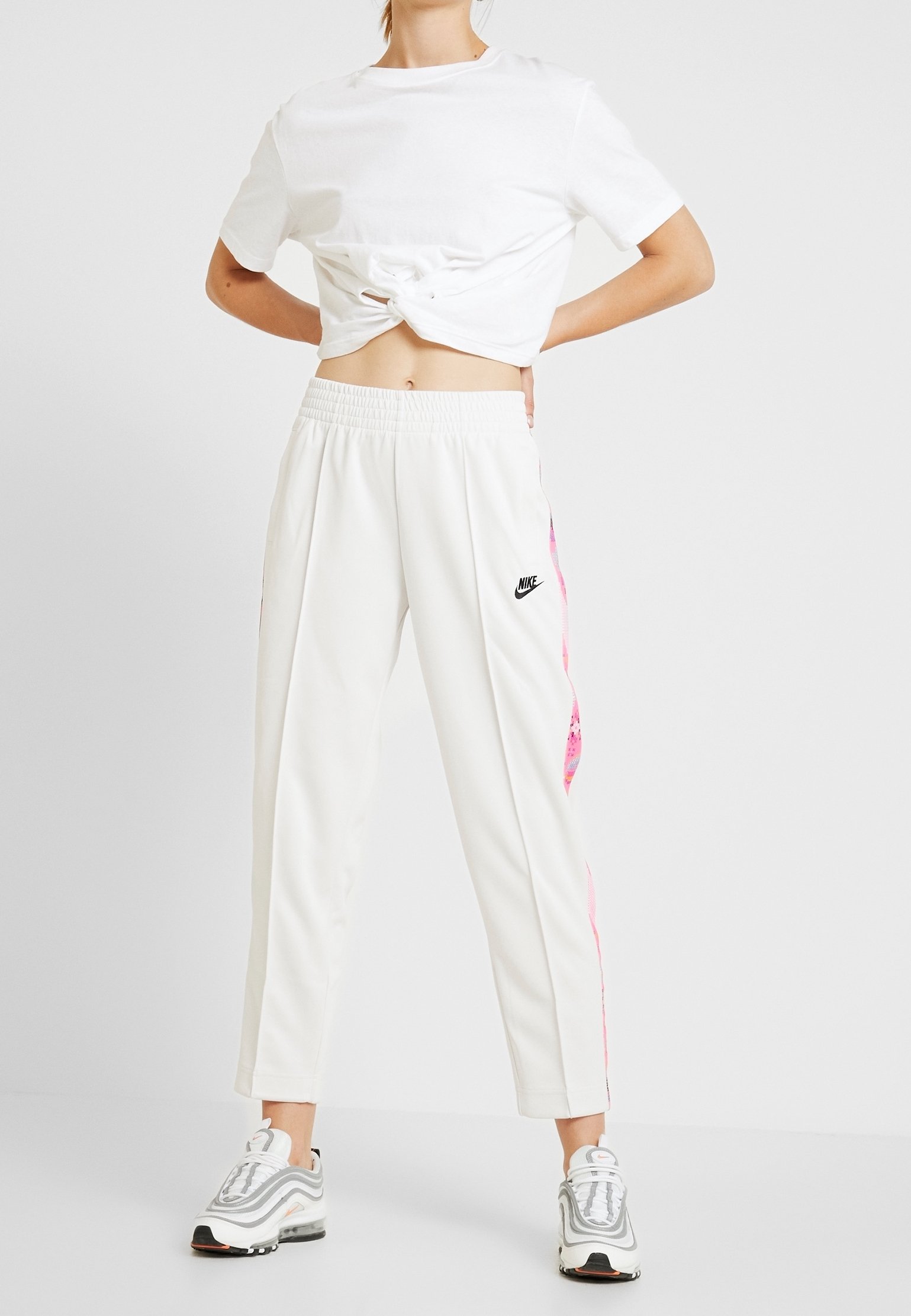 nike nude tracksuit womens