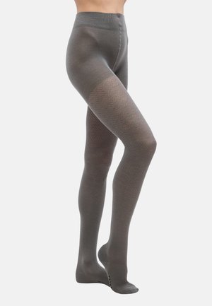 Hallid mustriga sukkpüksid kalasaba tekstuuriga, millel on sile vöökoht ja läbipaistvad sääreosad. Materjal paistab olevat veniv ja keha järgiv.