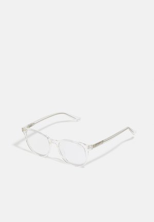 Clear plastic eyeglasses with round lenses, transparent frame, and subtle branding on temples. Lightweight and minimalist design.