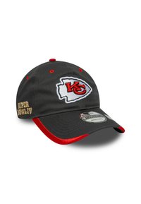 Black baseball cap with red accents, embroidered KC logo, and "SUPER BOWL LIV" text in gold. Made of fabric with a curved brim.