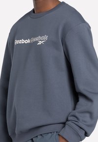 Reebok Suéter de forro polar - blue