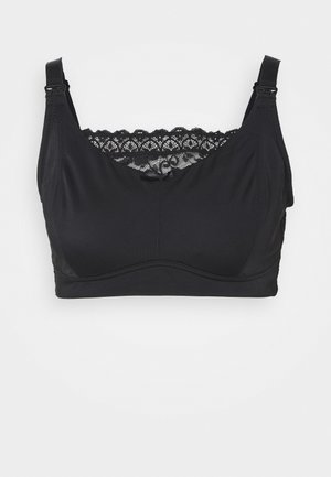 Sutiã preto com alças ajustáveis e rendas ao longo do decote. Tecido macio com uma textura suave e um laço decorativo ao centro.