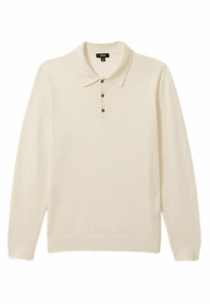 Cămașă polo bej cu mâneci lungi și guler, având trei butoane maronii la gât și o croială relaxată. Material moale, texturat.