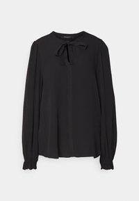Blouse noire en tissu léger avec un devant boutonné, des manches longues à poignets froncés et un détail à nouer au col.