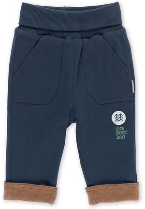 Navyblaue Kleinkinderhose mit elastischem Bund, zwei Fronttaschen, braunen umgeschlagenen Bündchen und dem "outdoor kid"-Logo am rechten Bein.