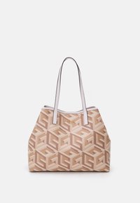 Beige kannettava laukku, jossa on valkoinen geometrinen kuvio. Varustettu vaaleanvärisillä kahvoilla ja kultaisella logotähtäyksellä. Suorakulmainen muoto, teksturoitu pinta.