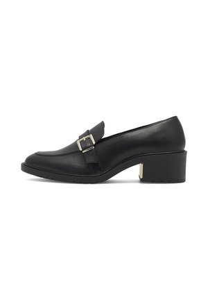 Black leather mid-heel loafer with square buckle strap and block heel featuring gold accent on white background.