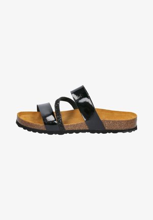 Black three-strap sandal with cork footbed, suede tan insole, and textured black rubber outsole, shown from the outer side.