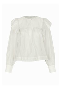 Biała bluzka z długim rękawem, okrągłym dekoltem, pojedynczym guzikiem przy kołnierzy, falbaniastymi detalami na ramionach i marszczonymi mankietami.