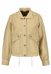Beżowa kurtka dżinsowa z kołnierzem, zapinana na guziki, z dwoma przednimi kieszeniami i elastycznymi mankietami. Regulowany fason dzięki ściągaczowi u dołu.