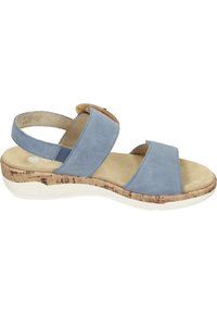 Sandale en cuir bleu avec deux larges brides, boucle réglable, semelle intermédiaire style liège et semelle extérieure en caoutchouc blanc.