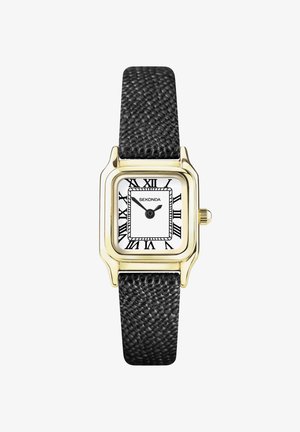 Montre rectangulaire dorée avec un cadran blanc et des chiffres romains noirs, équipée d'un bracelet noir texturé et d'une couronne ronde.