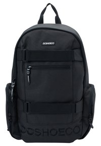 Black fabric backpack with zippered compartments, adjustable straps, side pockets, and embossed DC Shoe Co logo on the front.