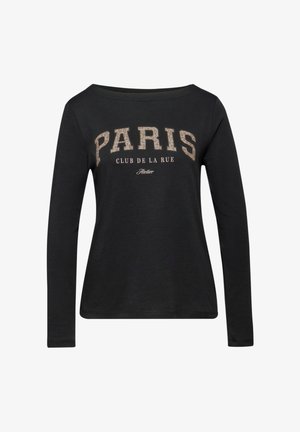 Chemise noire à manches longues avec un large col. Présente "PARIS" en imprimé léopard et "CLUB DE LA RUE" en blanc. Tissu doux.