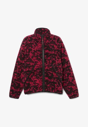 Fleece bunda s černobílo-červeným abstraktním vzorem, vysokým límcem, předním zipem a dvěma bočními kapsami s kontrastním lemováním.