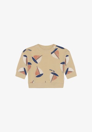 Sweat-shirt beige à manches courtes avec un motif de bateaux en bleu marine et rouge. Présente un col ras du cou et un ourlet arrondi pour un design décontracté.