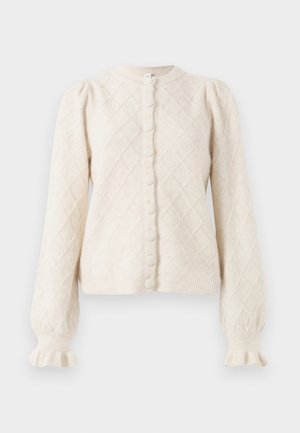 Cream-colored cardigan made of textured material with diamond pattern, featuring a round neckline, buttons down the front, and flared sleeves.