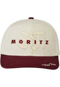 Snapback-cap med kremfarget overdel og maroon visir. Har broderte "ST" og "MORITZ"-tekst i kontrastfarger, med en teksturert finish.