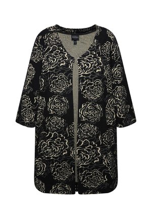 Black cardigan with cream rose pattern, open front, short sleeves, and a textured fabric; relaxed fit with a rounded hem.