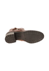 Brown leather boot with textured design, featuring a sturdy black rubber sole and zigzag tread pattern. Zip closure on the side.
