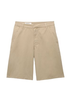 Beige kraťasy vyrobené z bavlny s plochým předním dílem, čtyřmi kapsami a přímým střihem. Obsahují prošité detaily poblíž kapes.