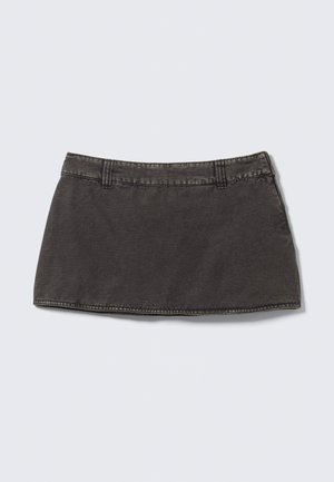 Black denim mini skirt with a slim fit, five belt loops, and a frayed hem. The fabric has a soft texture and slight distressed detailing.
